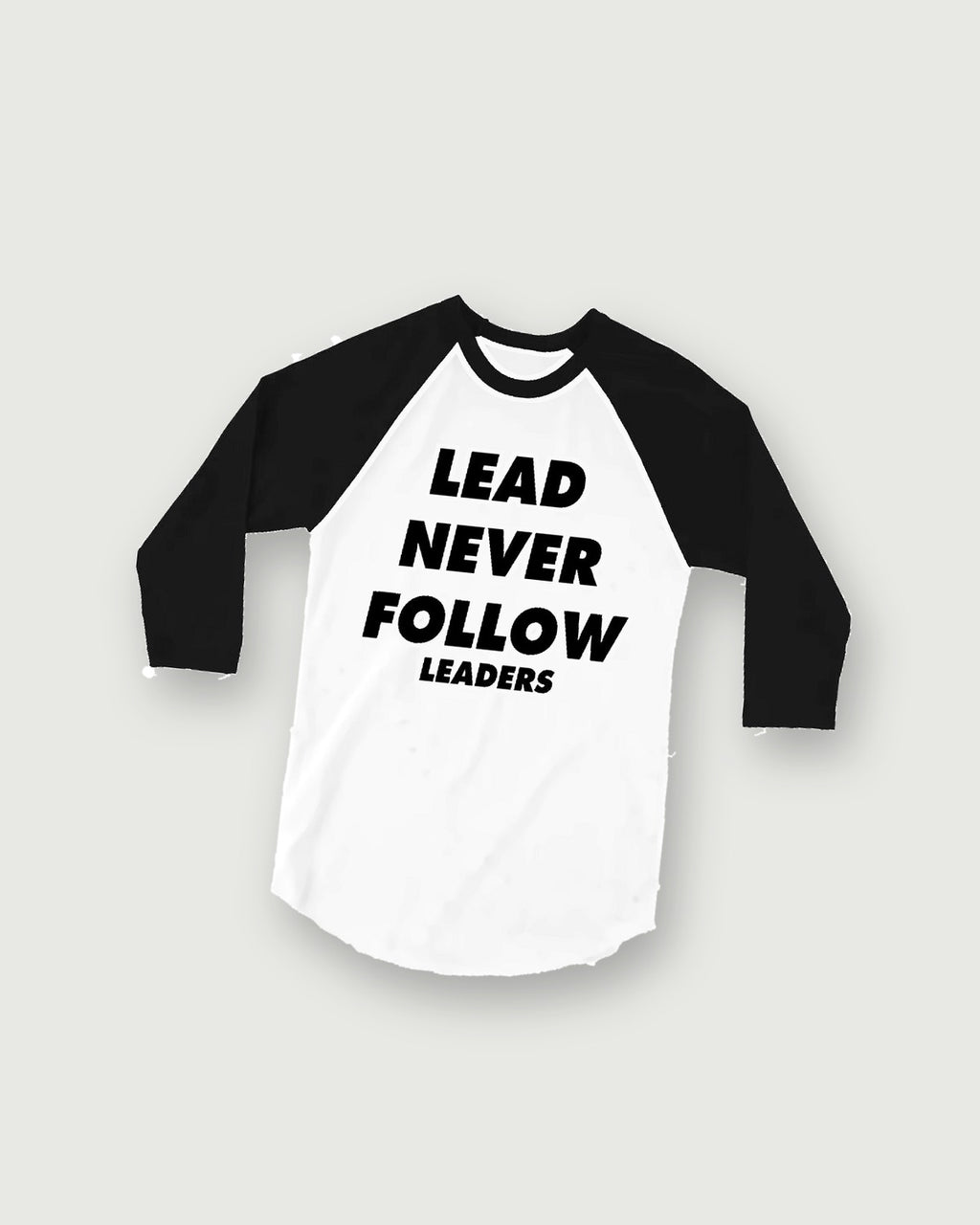 Lead Never Follow Leaders raglan tee with black sleeves, flat lay