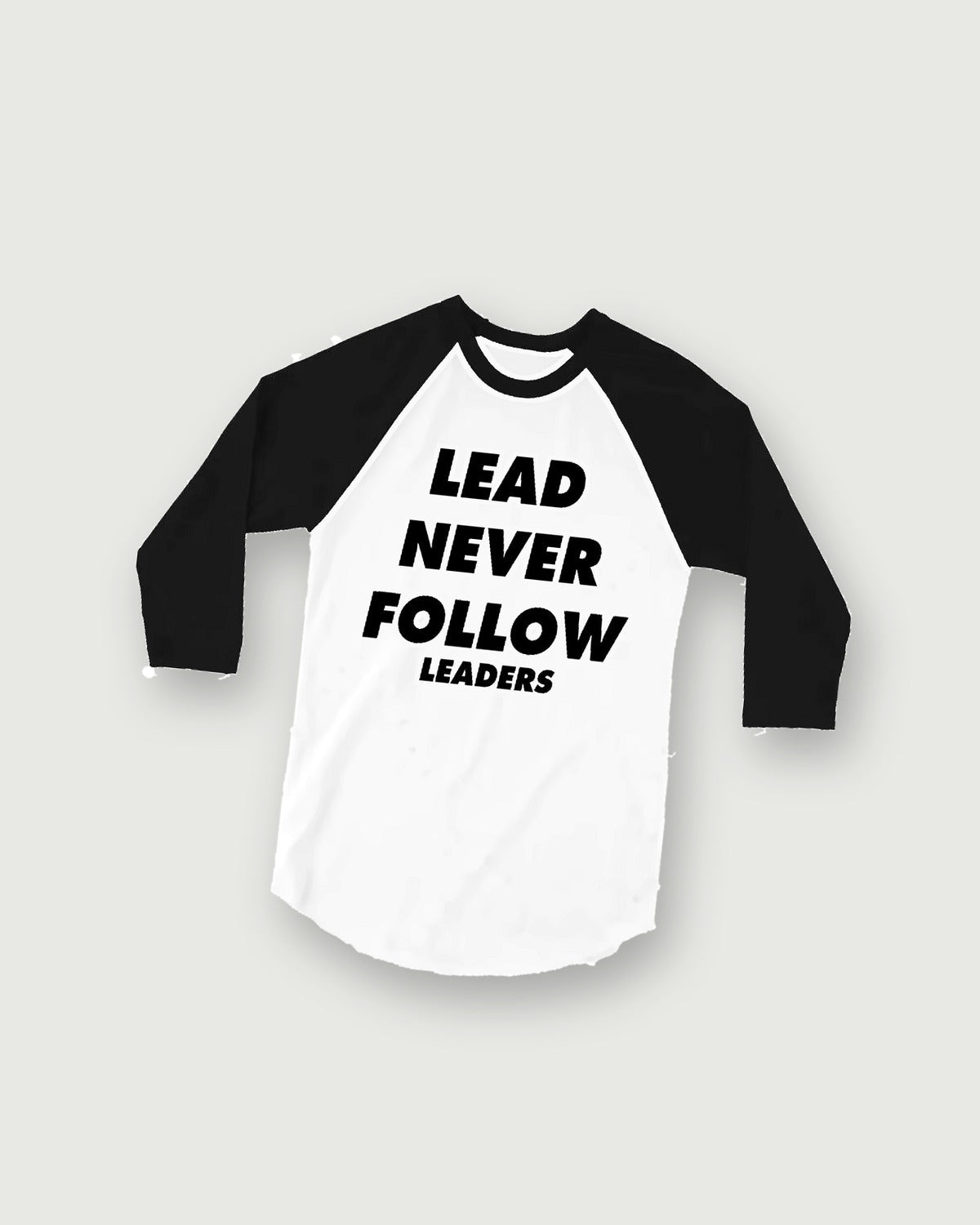 Lead Never Follow Leaders raglan tee with black sleeves, flat lay